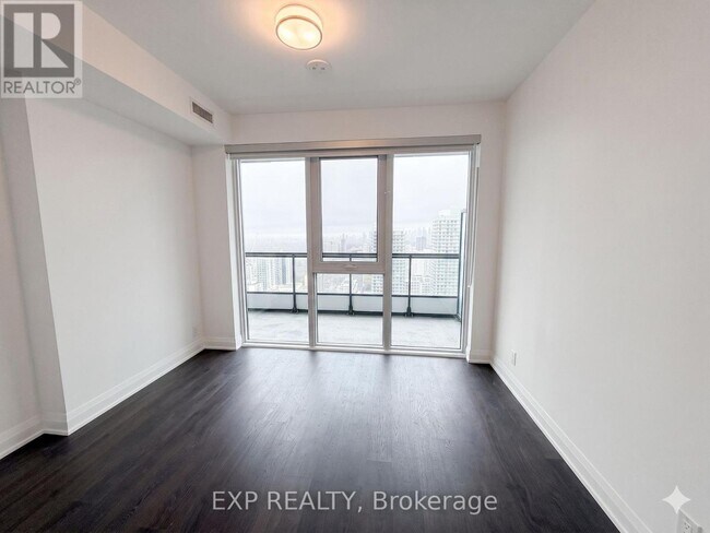 Photo du bâtiment - 65 Broadway Ave