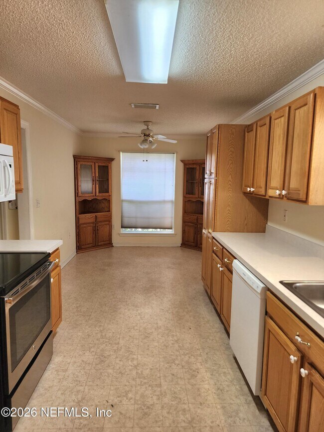 Foto del edificio - 7485 Cliff Cottage Dr