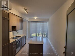 Building Photo - 30-1130 Elm Dr W