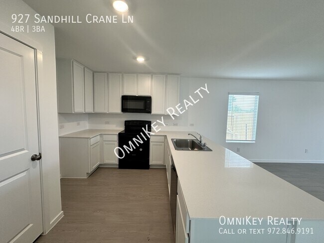 Foto del edificio - 927 Sandhill Crane Ln