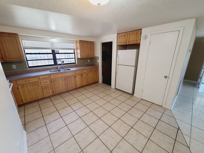 Building Photo - Charming Four Bedroom One Bathroom House photos coming soon