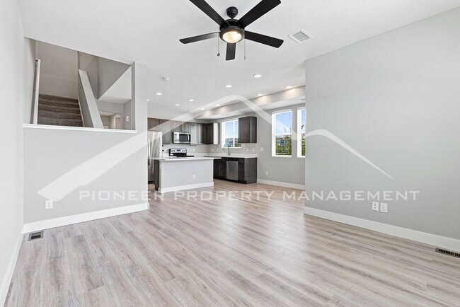 Building Photo - Spacious Townhouse with Central AC and 2-Car Garage