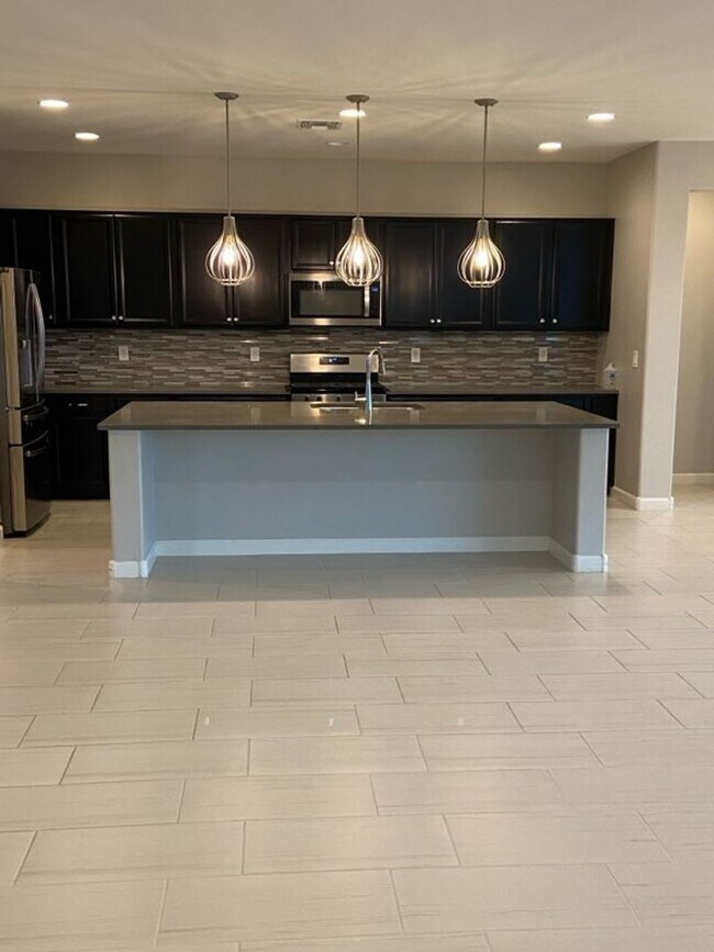 Building Photo - STUNNING NEWER HOME- GATED