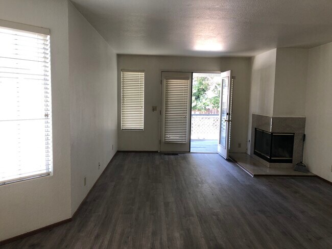 Living room open to a patio - 816 14th St