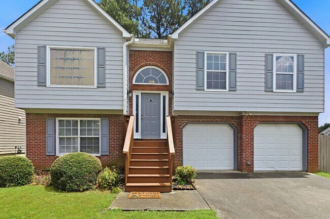 Building Photo - Spacious 4BR Home with Private In-Law Suite in Powder Springs