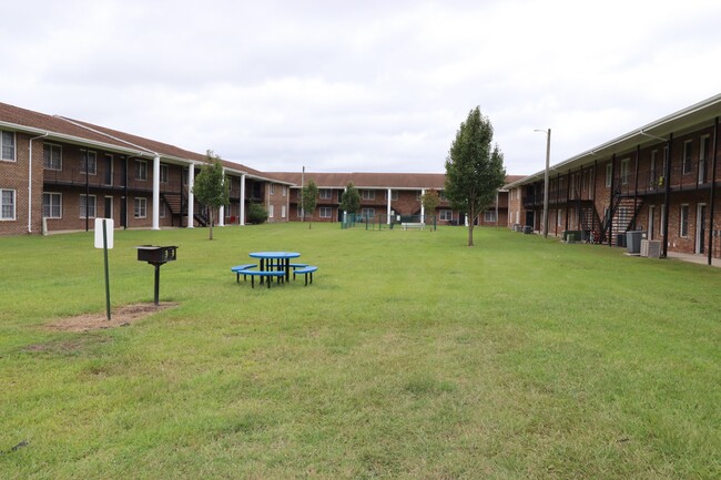 Interior Courtyard with Seating - Osprey Cove North Apartments