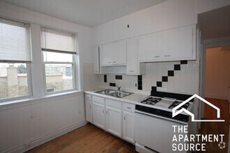 Building Photo - 3052 W Berteau Ave