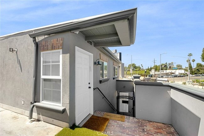 Building Photo - 6000 Woodman Ave