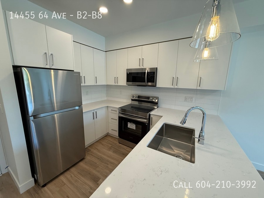 Primary Photo - Brand New Condo in Sterling at Bell Centre...