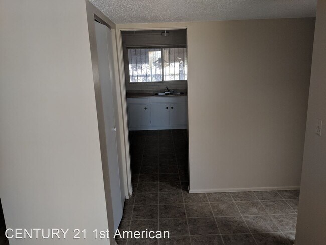 Building Photo - 3 br, 2 bath House - 7509 E. GOLF LINKS RD.