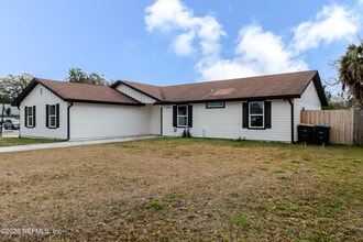 Building Photo - 10036 Delano Dr N