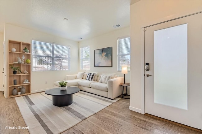 Photo - Modern 3BR Townhome | 2-Car Garage | Pool, Gym & Light Rail Access