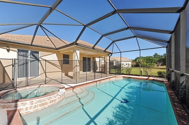 Building Photo - 1902 Coconut Palm Cir