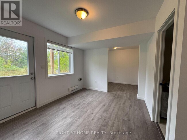 Photo du bâtiment - 99 HighRiver Trl