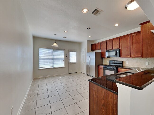 Foto del edificio - 9719 Bark Ridge Ln