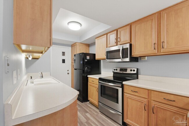 Foto del edificio - 9976 Fairway Villas Ln
