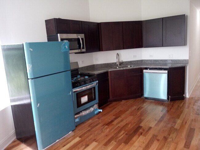 Building Photo - 5147 S Prairie Ave