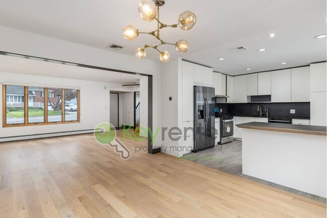 Photo - Spacious 4-Bedroom Home in Maywood | Yard, Home Office & Solar Panels