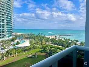 Building Photo - 10275 Collins Ave