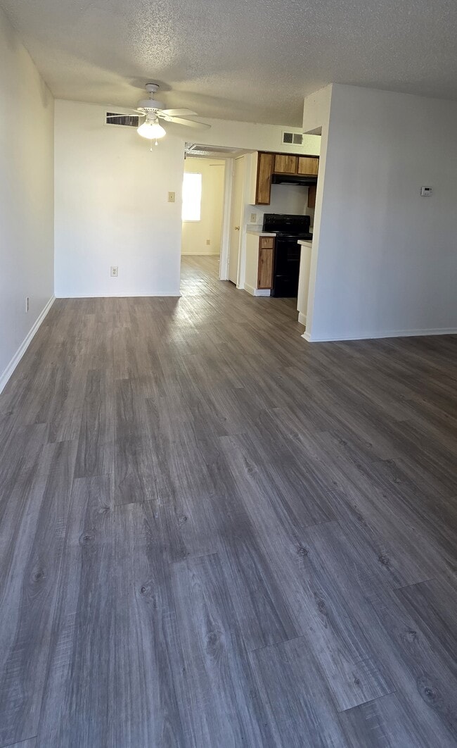 Living room/dining area - La Casa Apartments