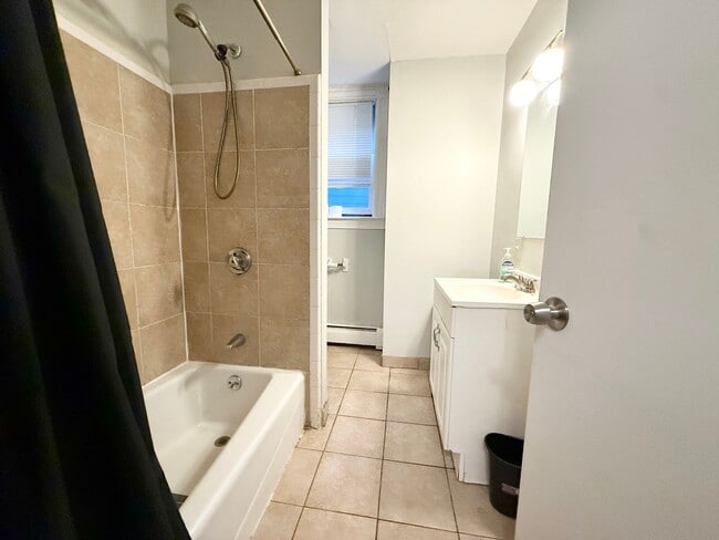 Building Photo - 2BR Mission Hill Apartment | Garage Parking | Modern Kitchen | Cats OK | 9/1