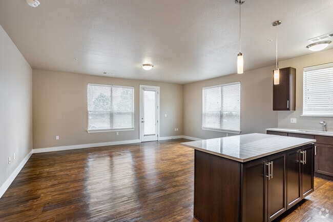 3BR, 3BA - 1,520SF - Gold - Living Room - West 8th & Basecamp