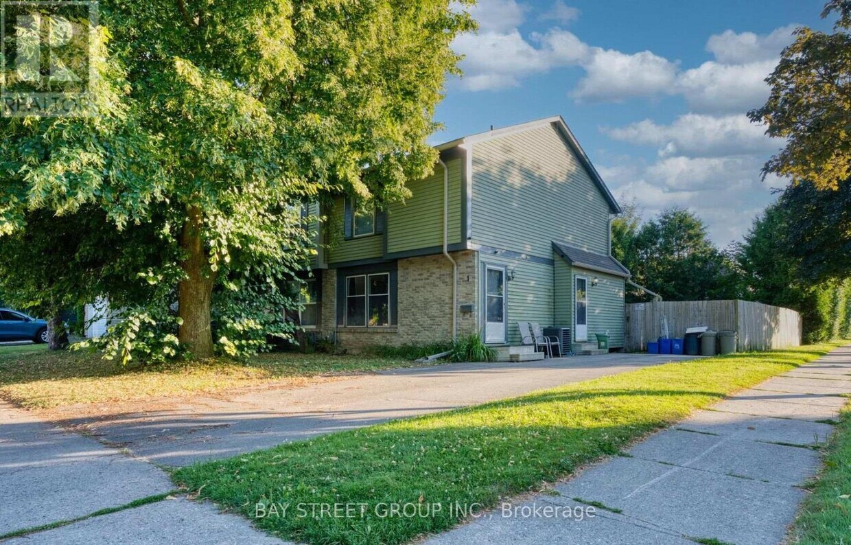 Primary Photo - 1 Ranchwood Crescent