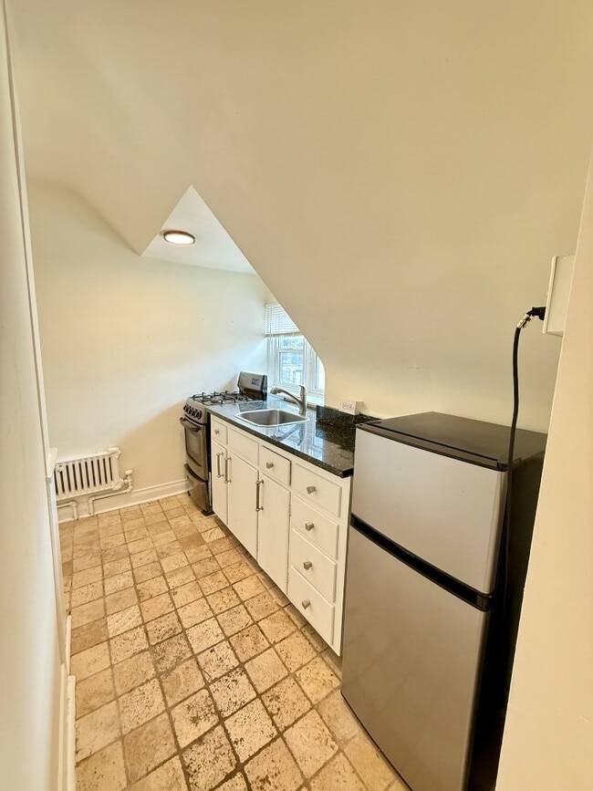 Photo - Unique Top floor Studio Apartment in Eclectic Capitol Hill House! Available Now!