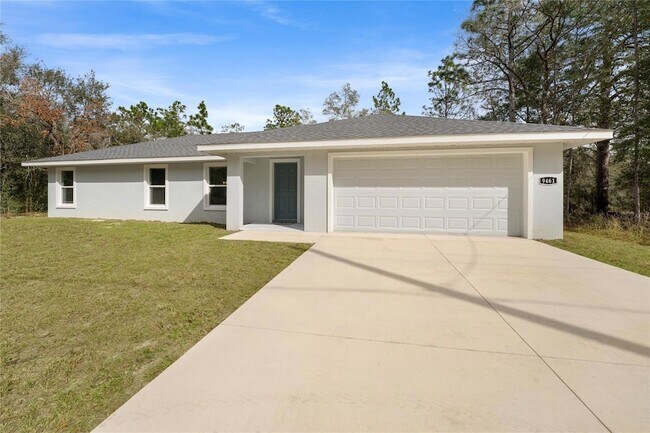 Building Photo - 9461 N Sandree Dr
