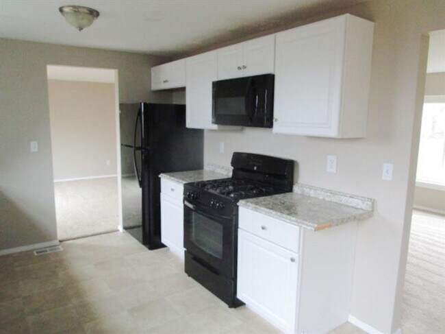 Foto del edificio - Spacious 3-Bedroom 1.5 bath Home with Fenced Yard & Garage – Ready for You!
