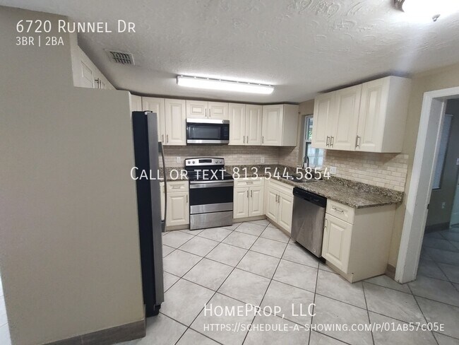 Building Photo - New Port Richey Chic: 3BR Home with Modern...