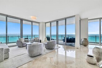 Building Photo - 10295 Collins Ave