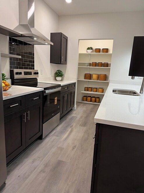 Kitchen w/ Quartz Island & Counters - Point Gardens Apartments