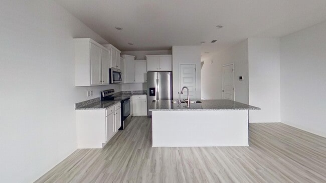 Building Photo - Beautiful Newer Townhouse with all LVP