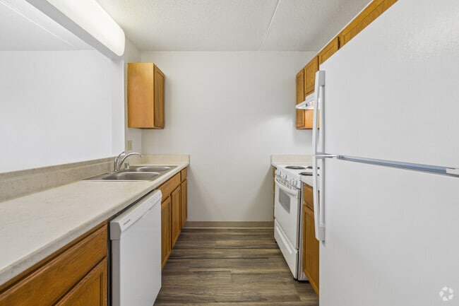 2BR, 1BA - 782SF -Kitchen - Como by the Lake Senior Apartments