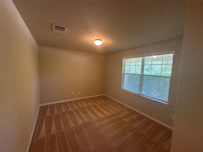 Foto del edificio - 7714 Squirrel Hollow Dr