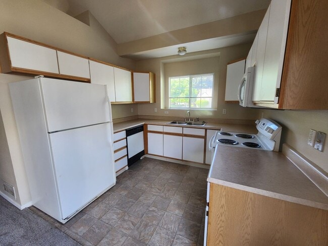 Building Photo - Available Now. Easy Living Split Level Con...