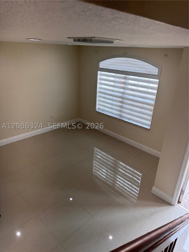 Building Photo - 7075 NW 173rd Dr