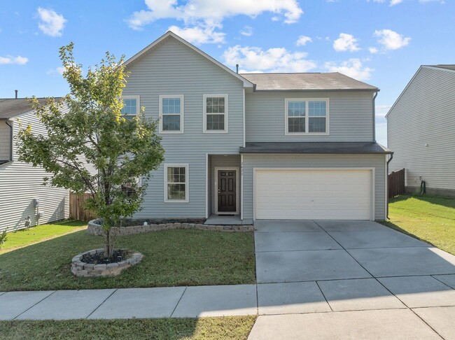 Building Photo - Spacious 5 Bedroom Home with 2-Car Garage,...