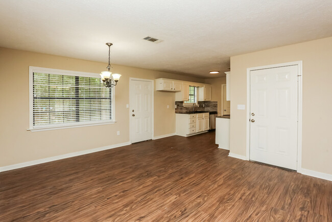 Building Photo - Cozy Three Bedroom with Carport