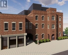 Building Photo - 604 Queen St S