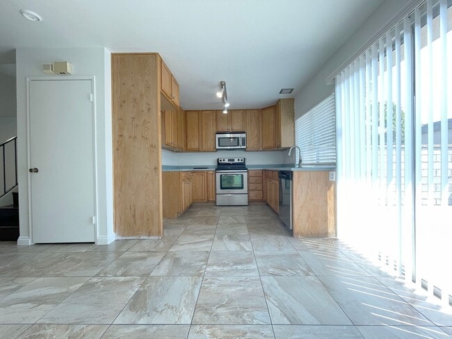 Photo - 3 Bed + 1.5 Bath + 2 Car Garage Apartment