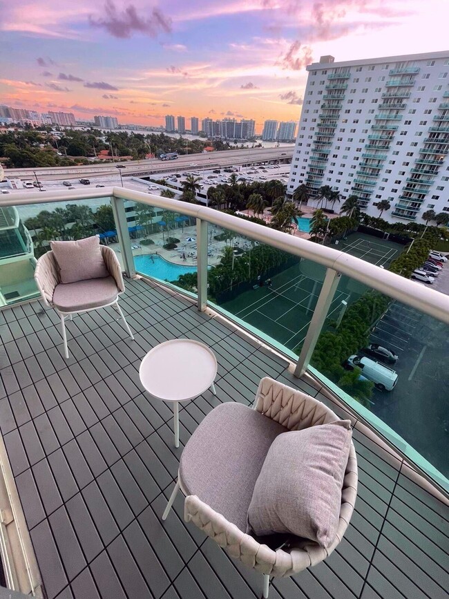Building Photo - 19370 Collins Ave