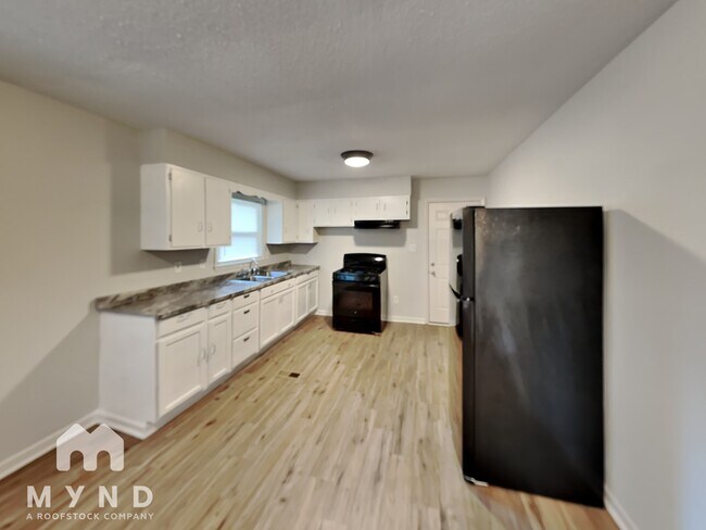 Foto del edificio - 3211 Spring Valley Dr