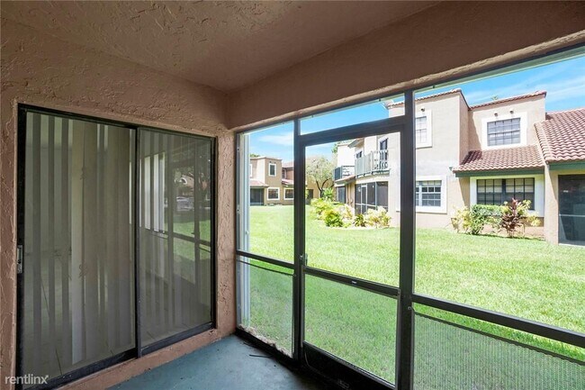 Building Photo - 3 br, 2.5 bath Townhome - 9001 W Sunrise Blvd