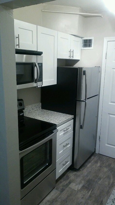Building Photo - 1500 NE 50th Ct