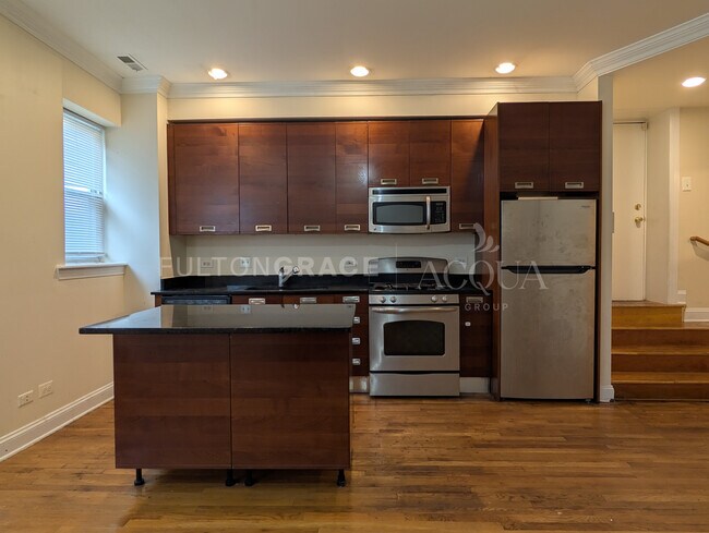Foto del edificio - 6935 N Oakley Ave