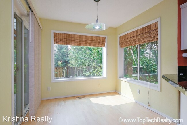 Building Photo - 4 br, 2.5 bath House - 5910 NW Snowlily Dr