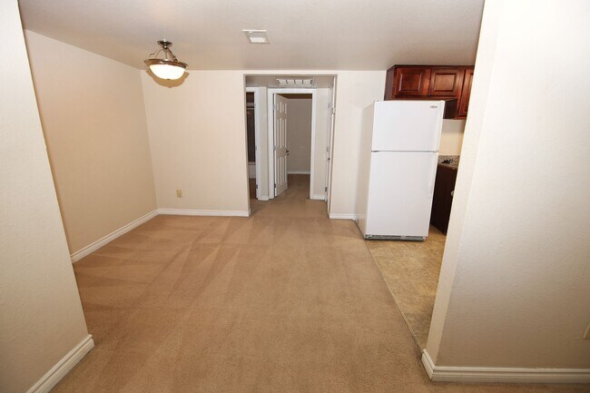 Building Photo - UPGRADED BELLA VITA 1 BEDROOM CONDO