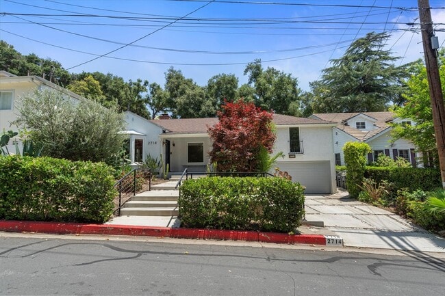 Building Photo - This beautifully updated 4-Bed, 2-Bath Hom...
